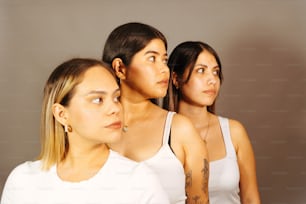 a group of women standing next to each other