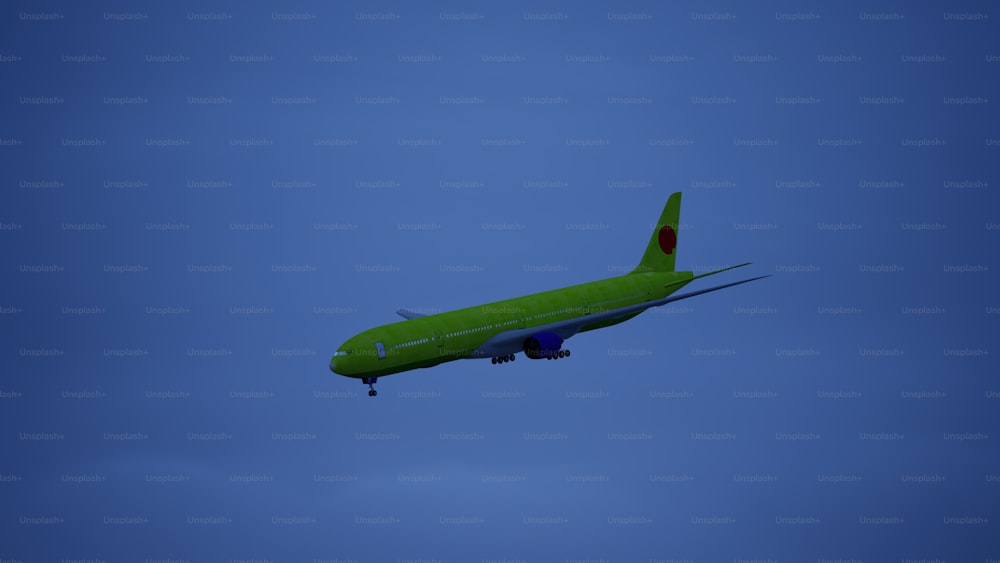 a large green airplane flying through a blue sky