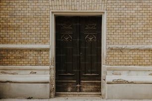 a couple of benches sitting in front of a door