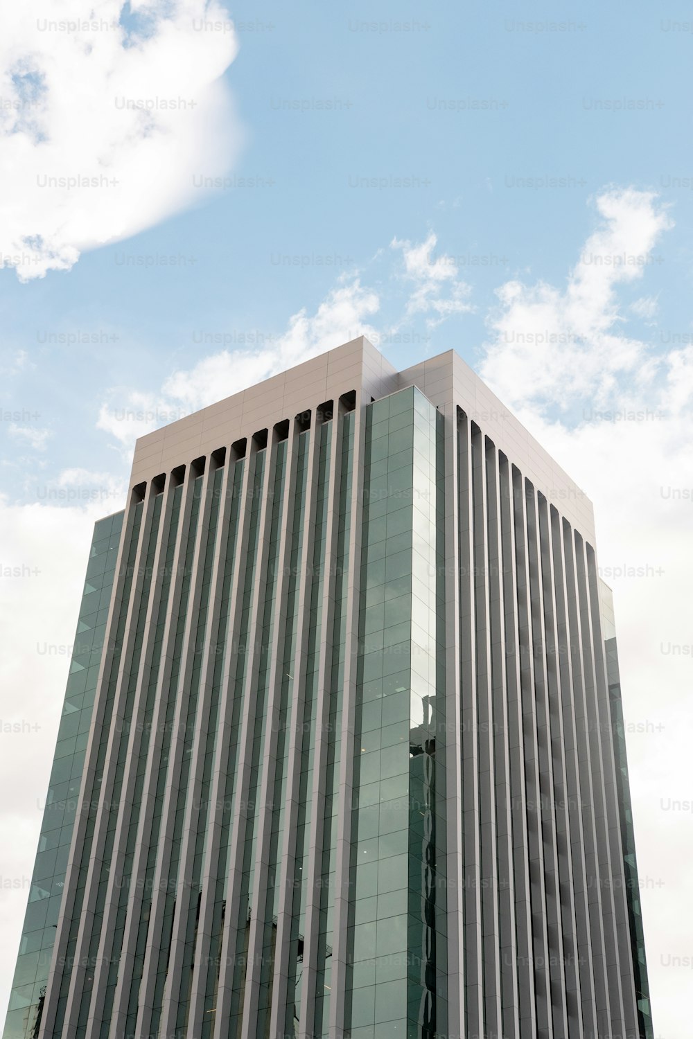 a tall building with a sky background