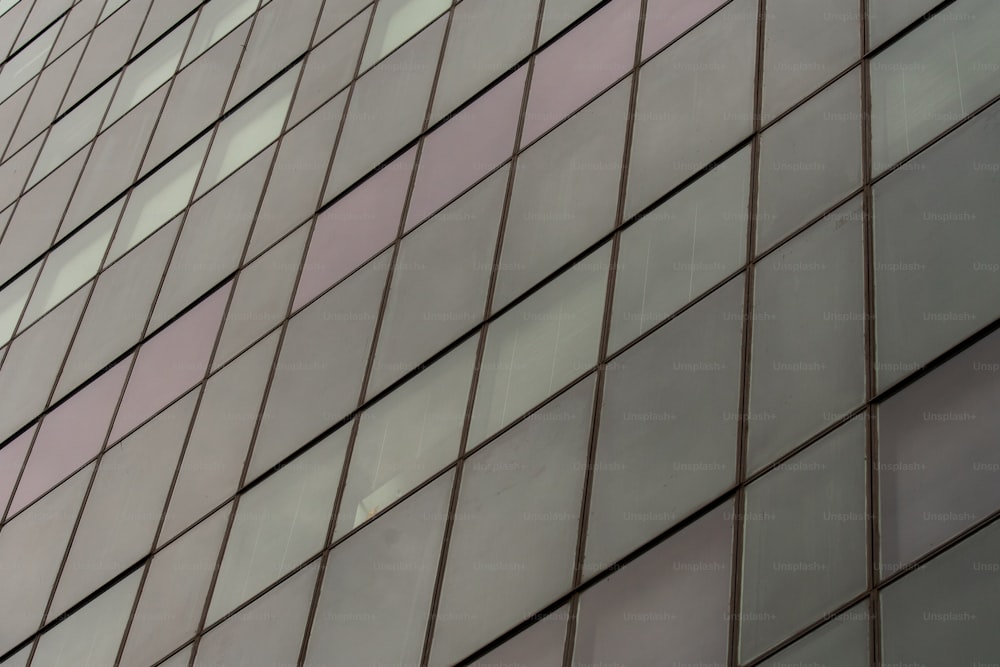 a close up of a tall building with lots of windows