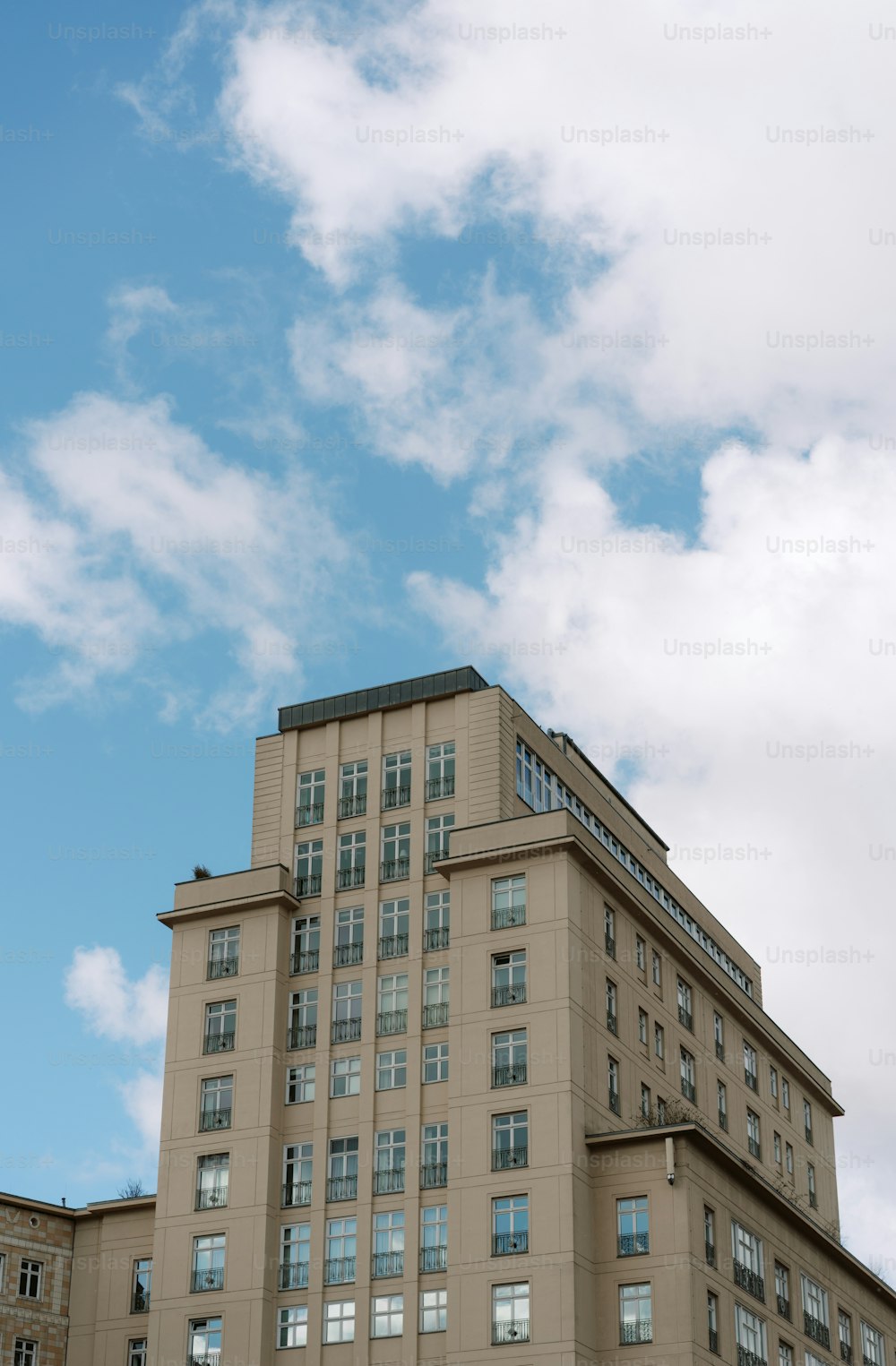 a tall building with many windows on top of it