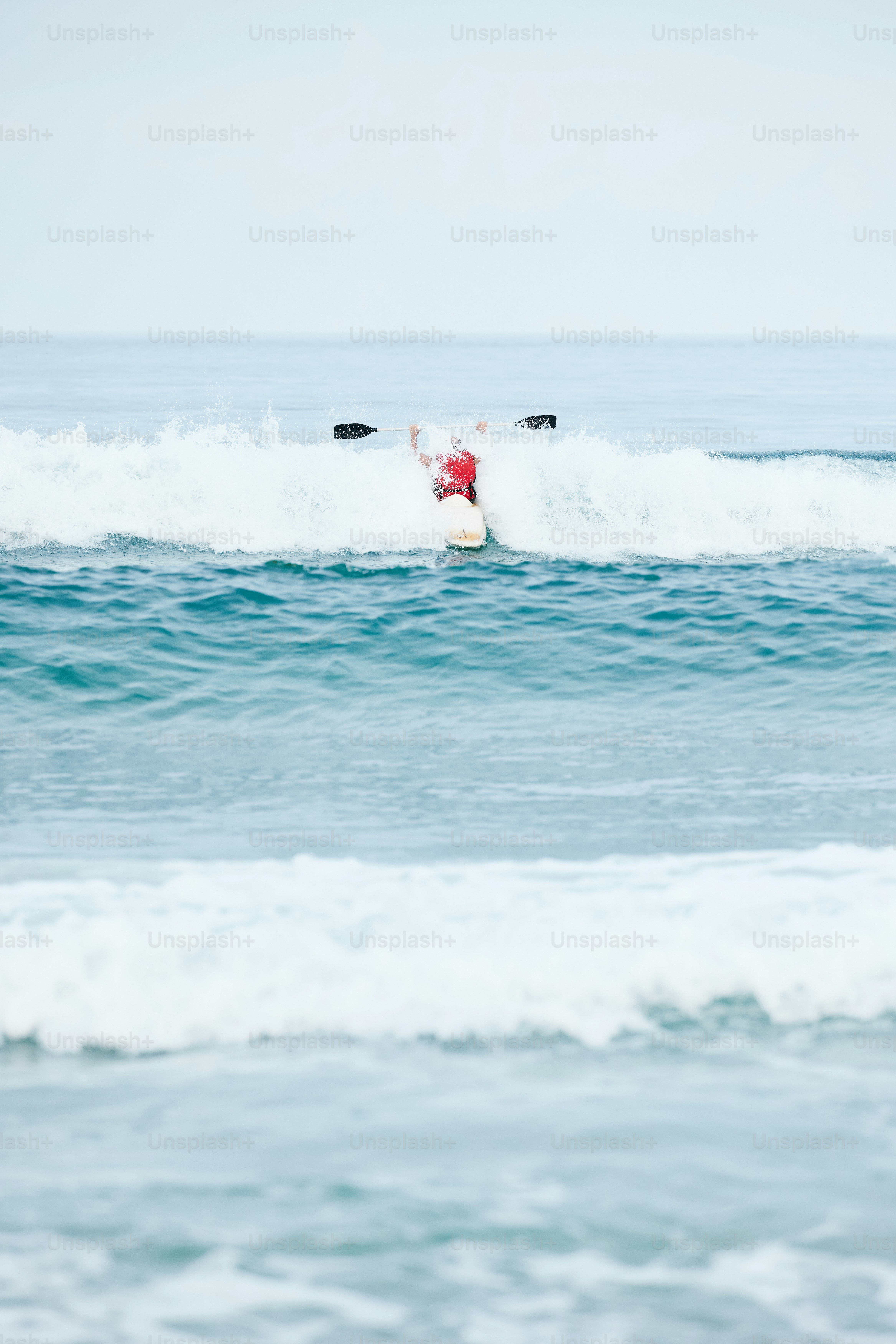 A man riding a wave on top of a surfboard photo – Sea Image on Unsplash