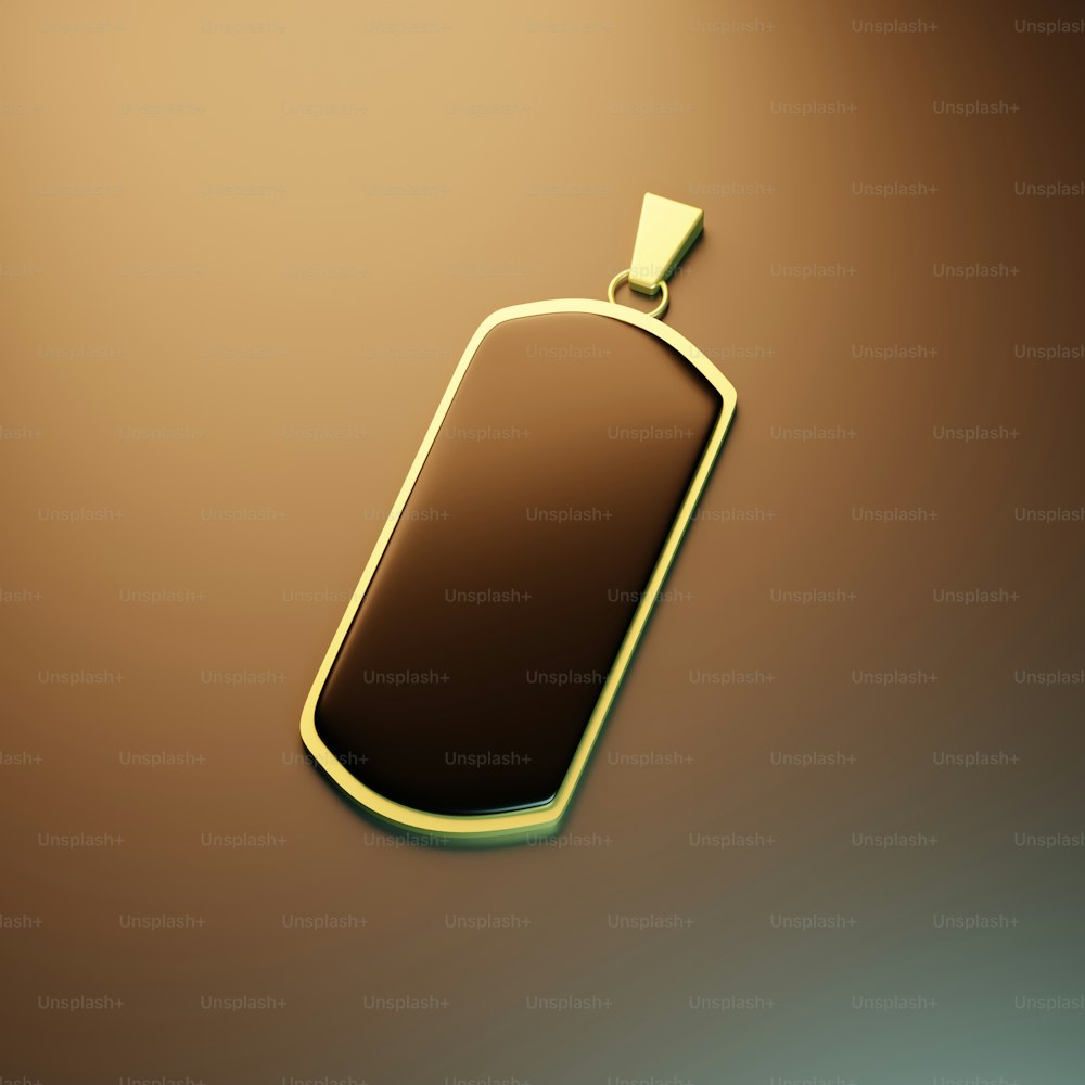 a gold pendant on a brown background