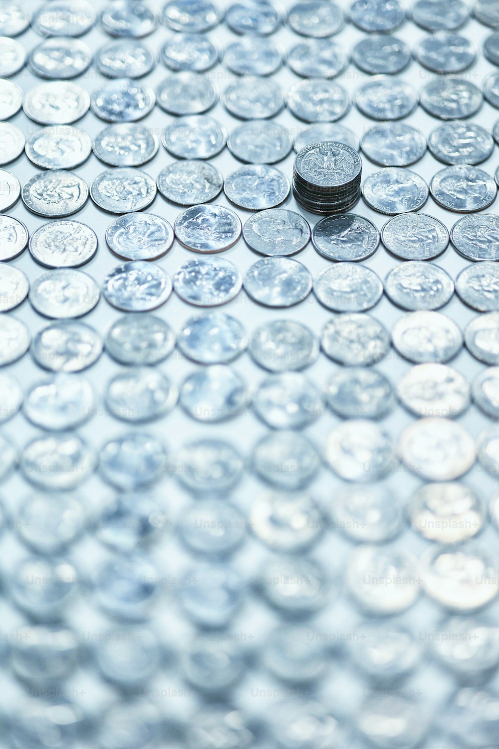 a close up of a pile of coins