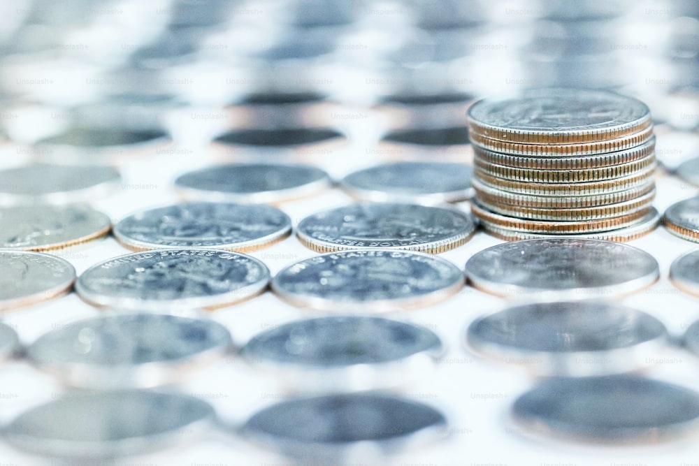 a pile of coins sitting on top of a table