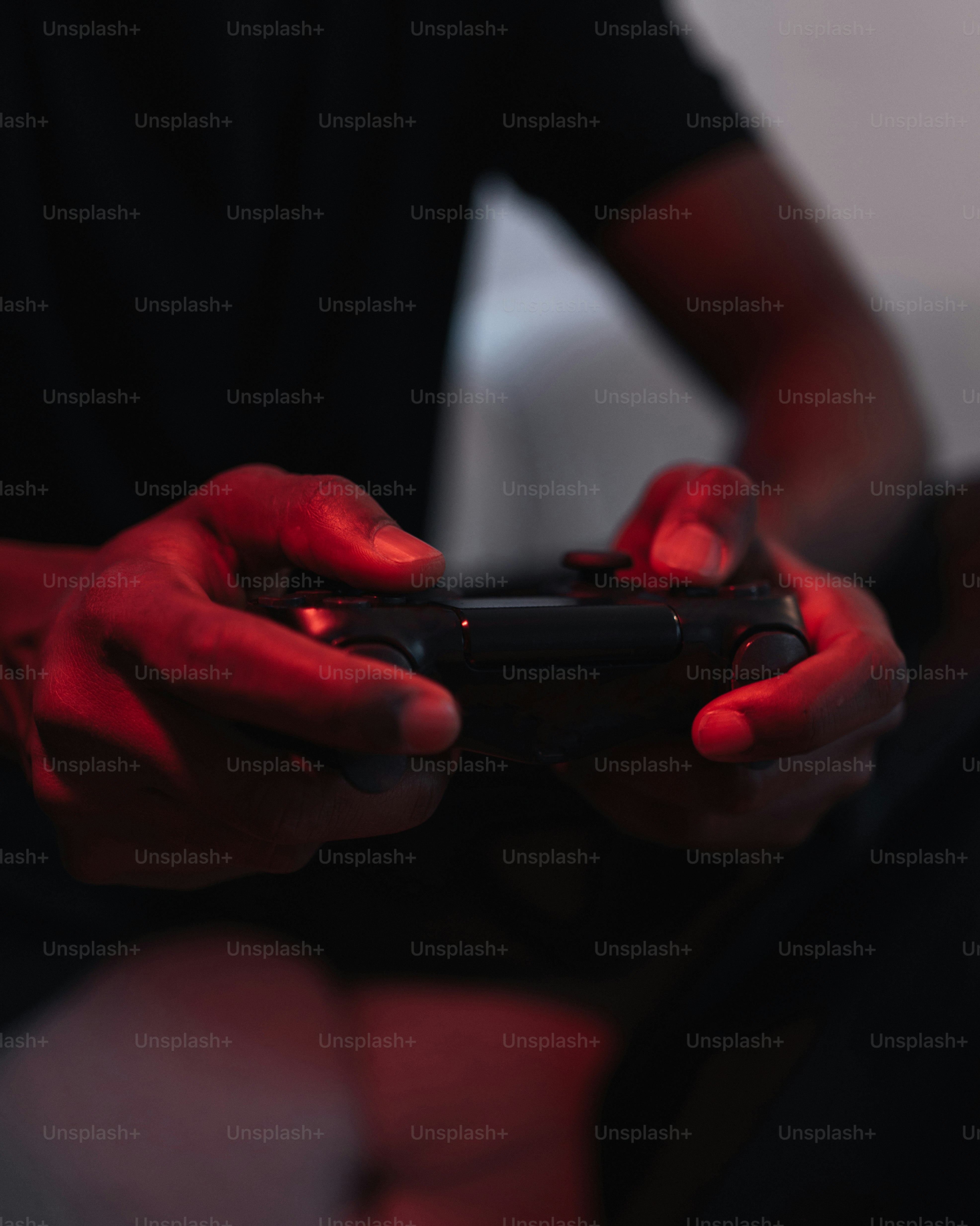 a person holding a cell phone in their hands