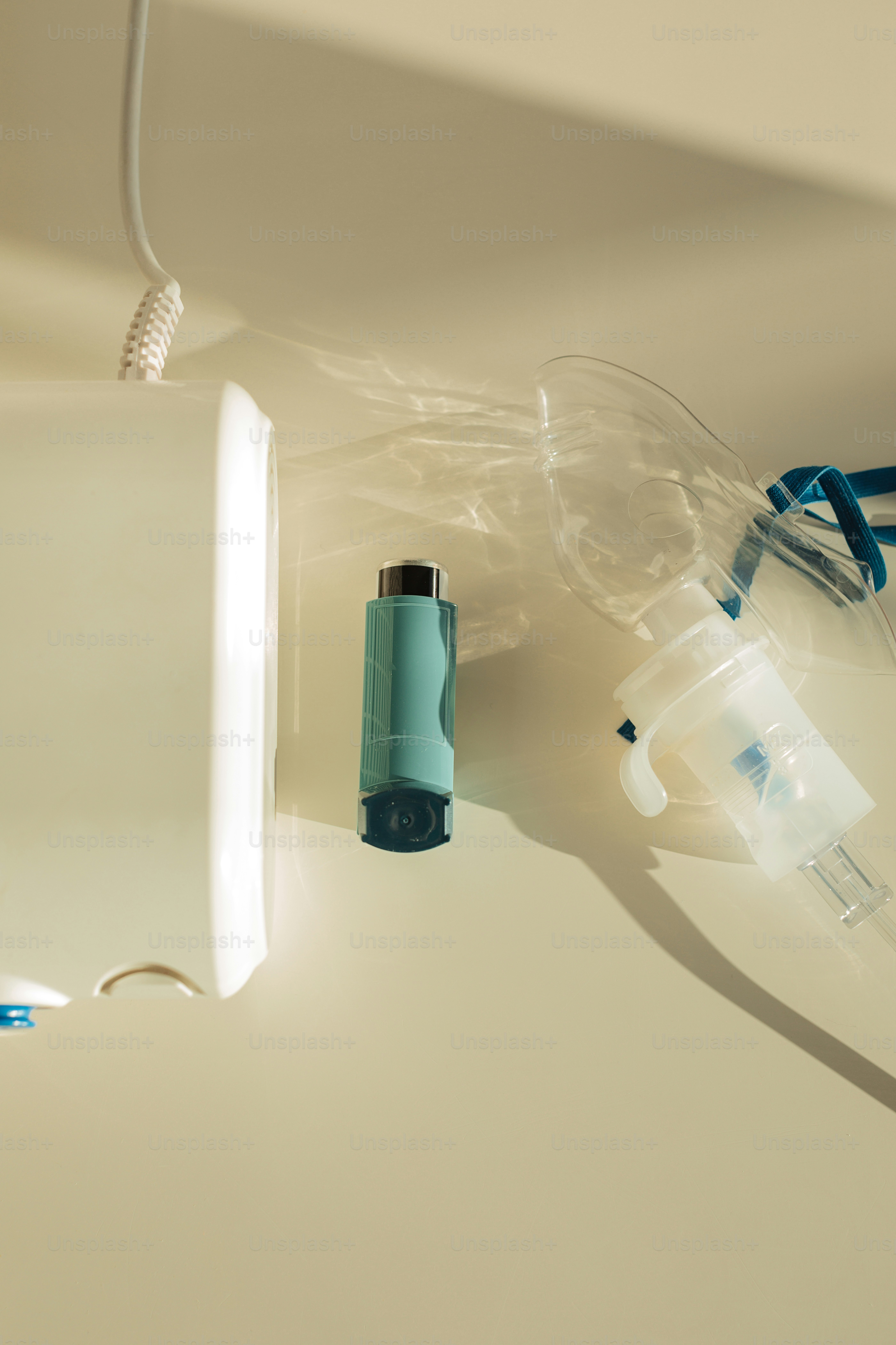 a toothbrush, toothpaste, and a tube of toothpaste are