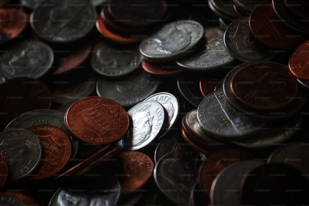 a pile of coins sitting on top of each other