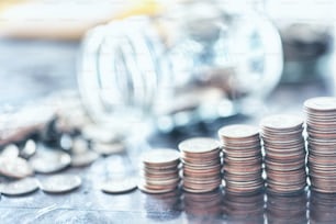 a pile of coins sitting on top of a table