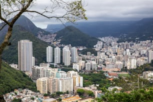 a view of a city with mountains in the background