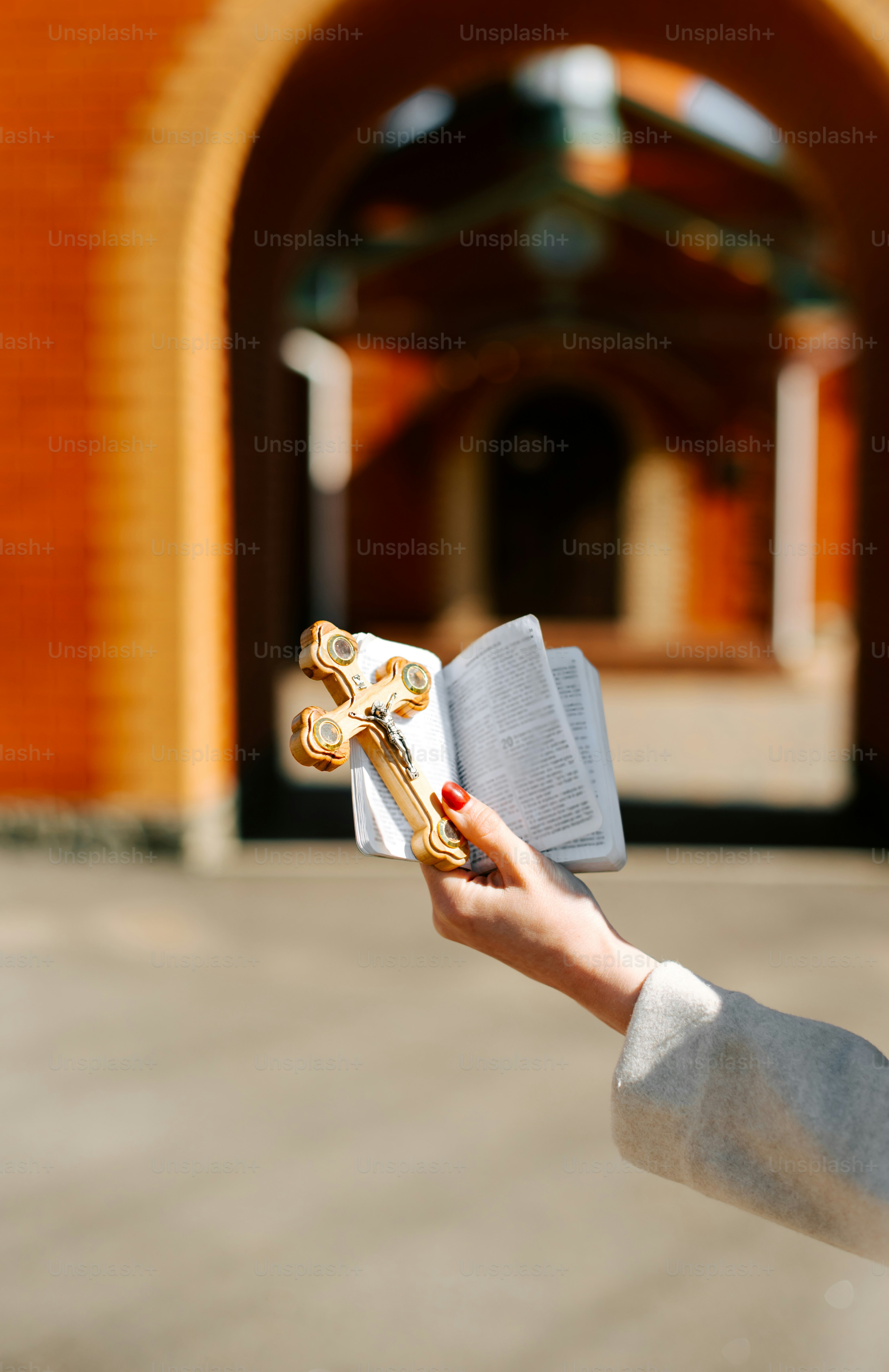 a person holding a book in their hand