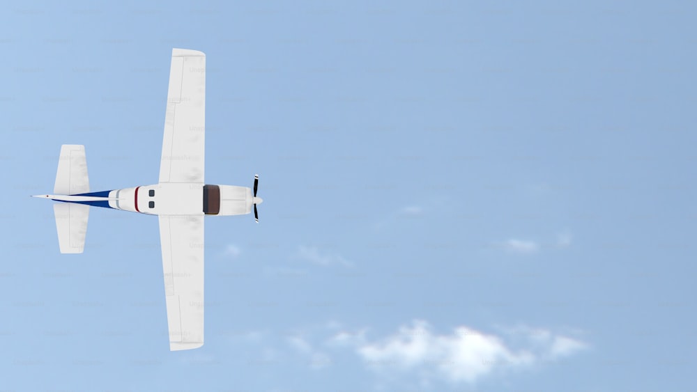 a small airplane flying through a blue sky