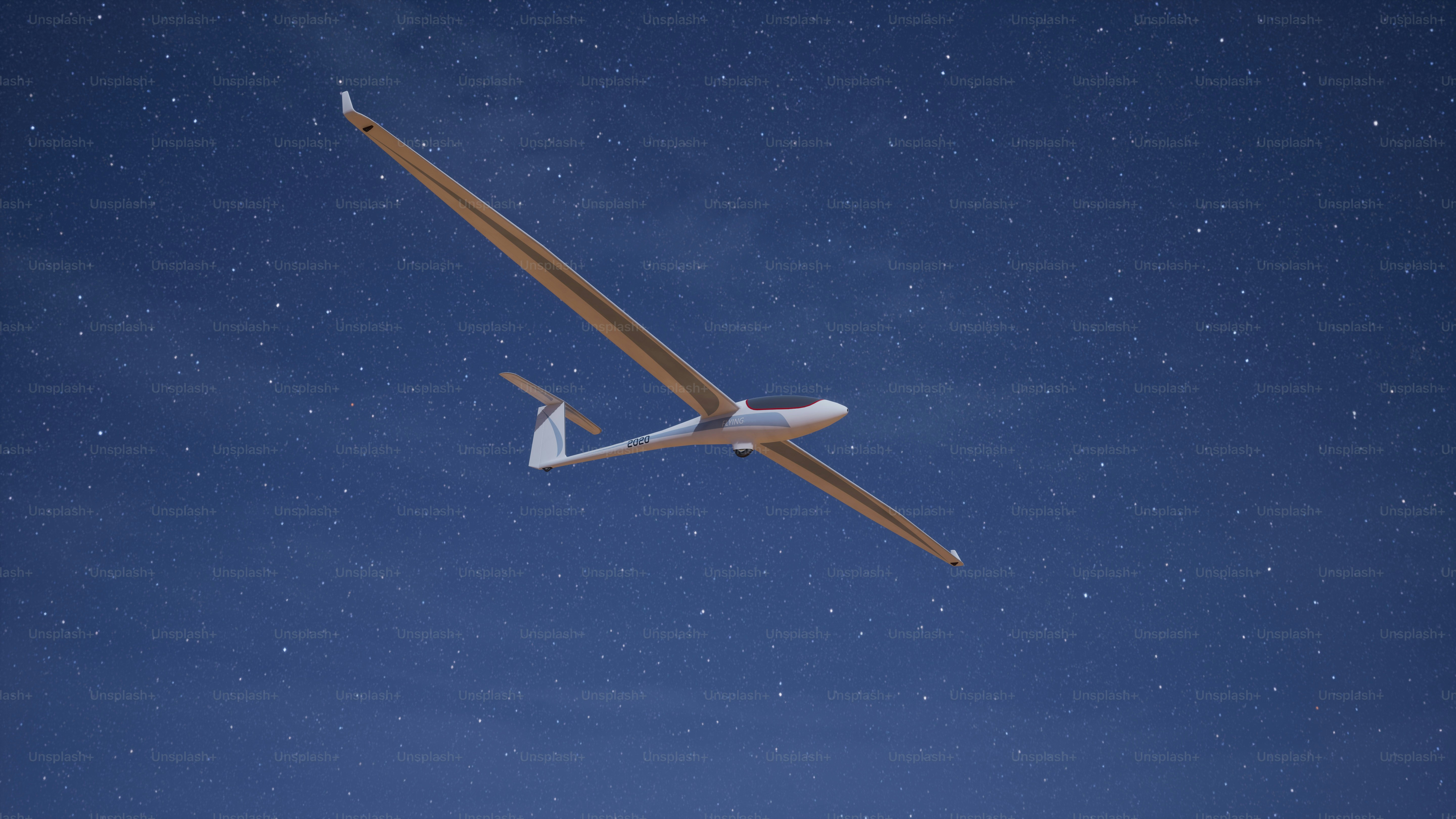 an airplane flying in the sky at night