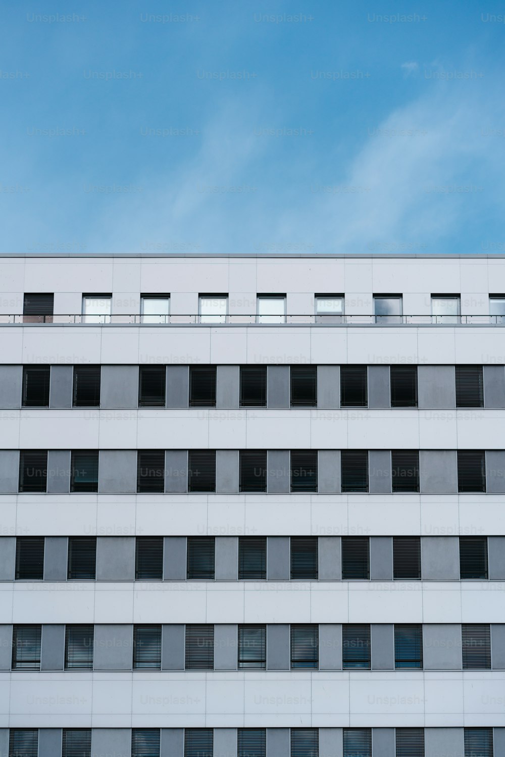 a tall building with lots of windows on top of it