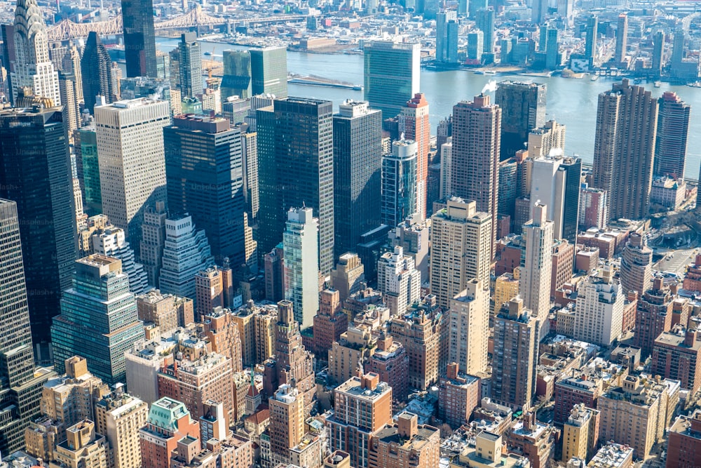 an aerial view of a city with tall buildings