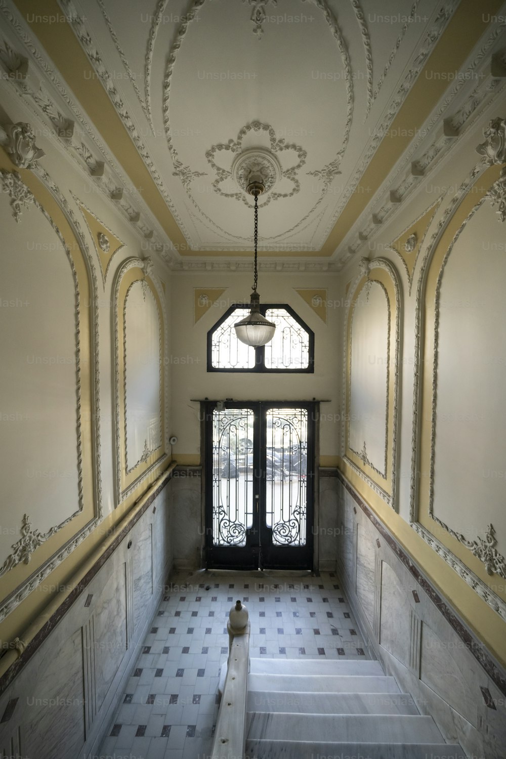 a hallway with a door and a window in it