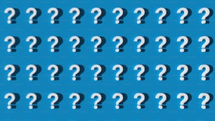 a group of question marks on a blue background