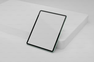 a white box with a black frame on top of it