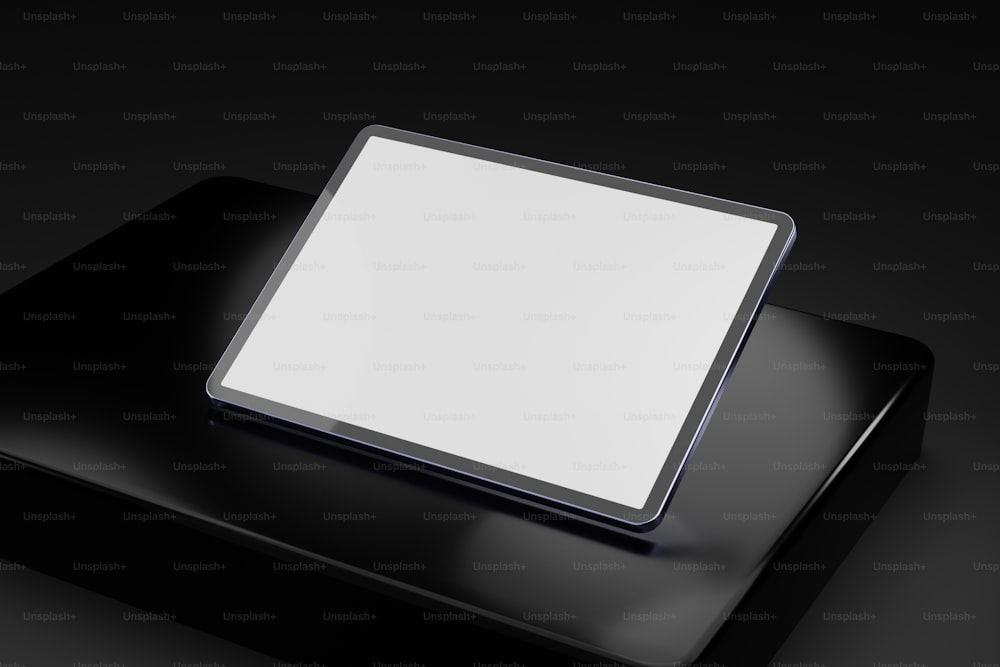 a black square plate with a white square on top of it