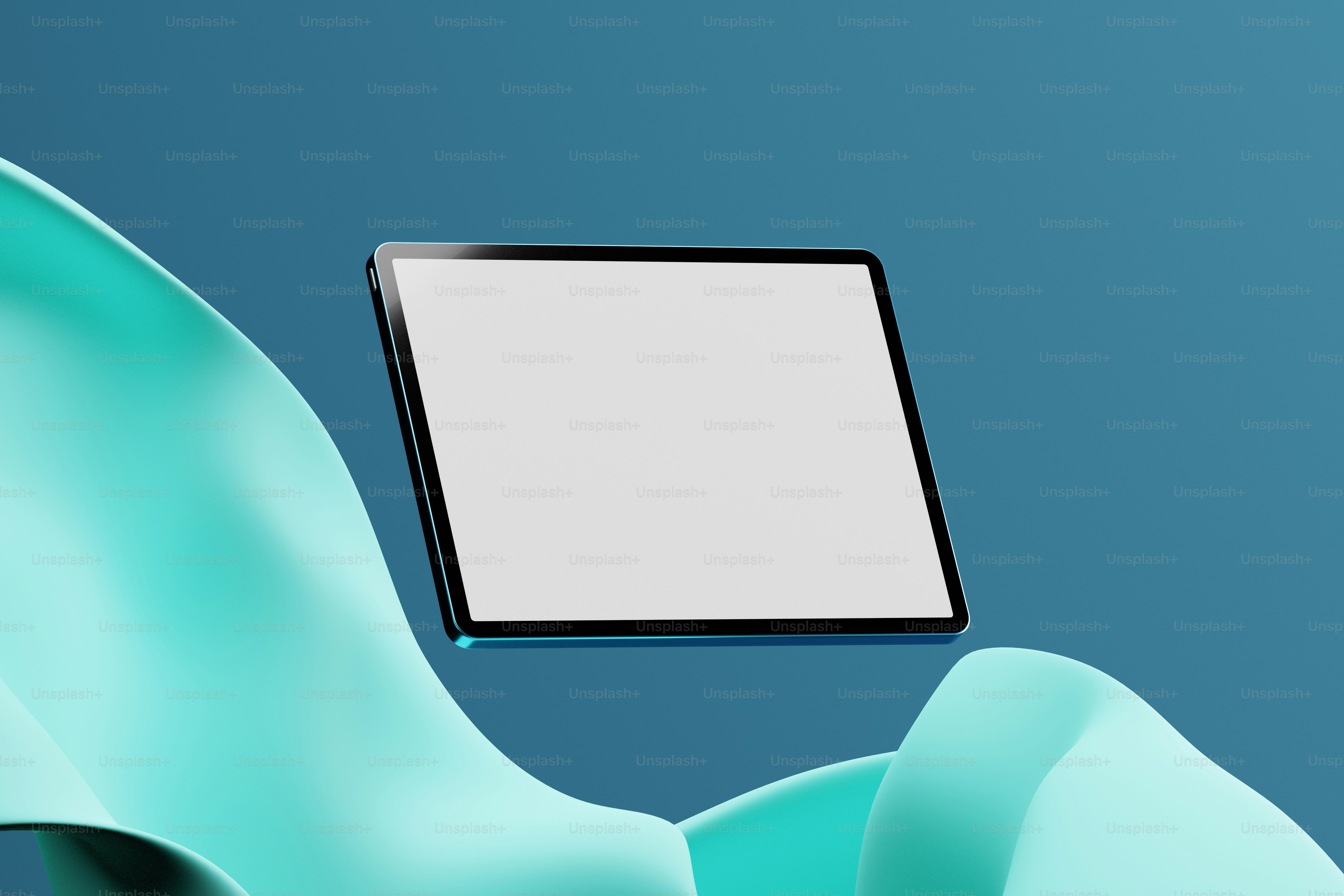 un computer tablet seduto sopra una sedia blu