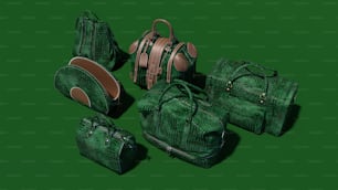 녹색 바닥 위에 앉아 있는 녹색 가방 그룹
