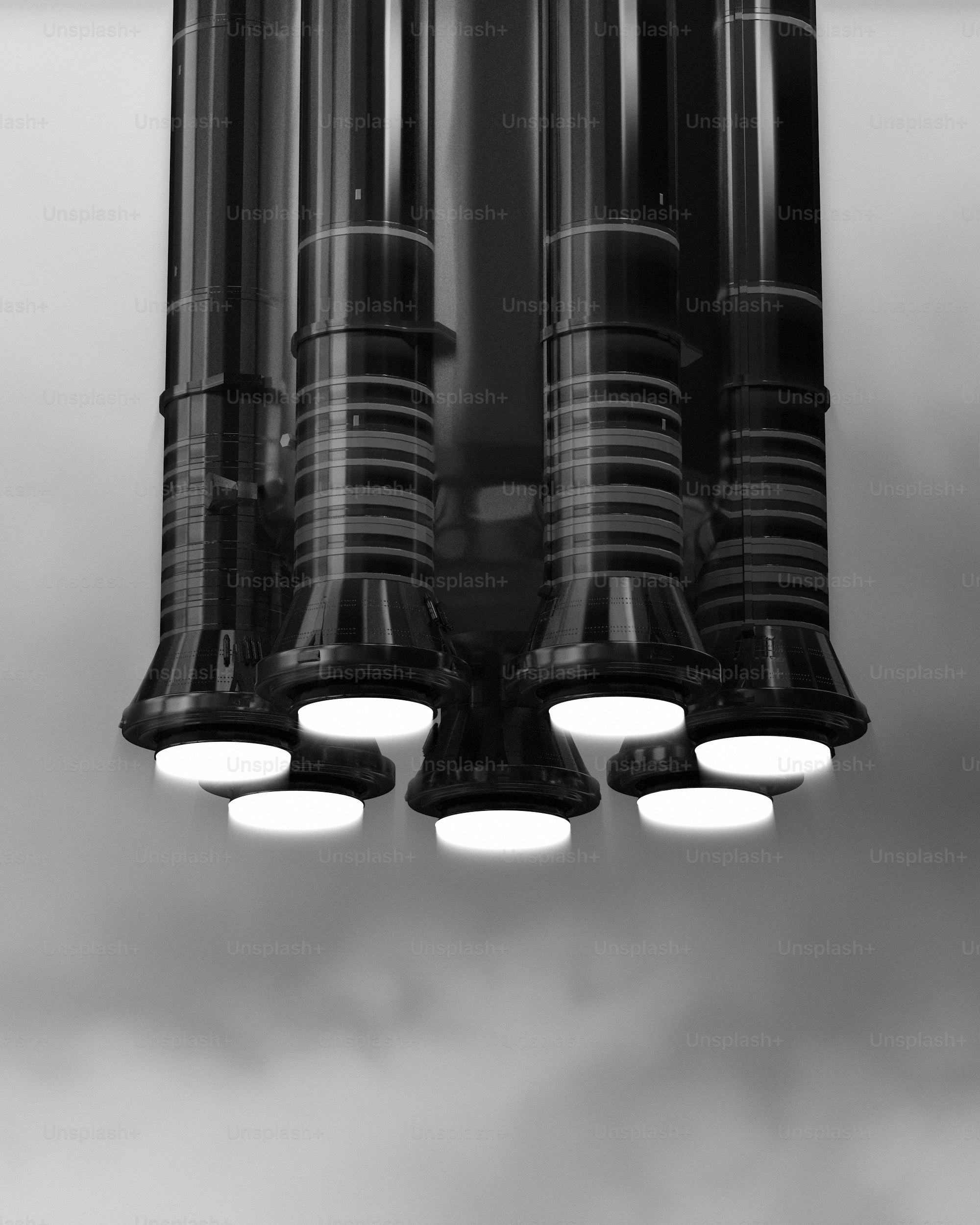 a group of lights hanging from a ceiling