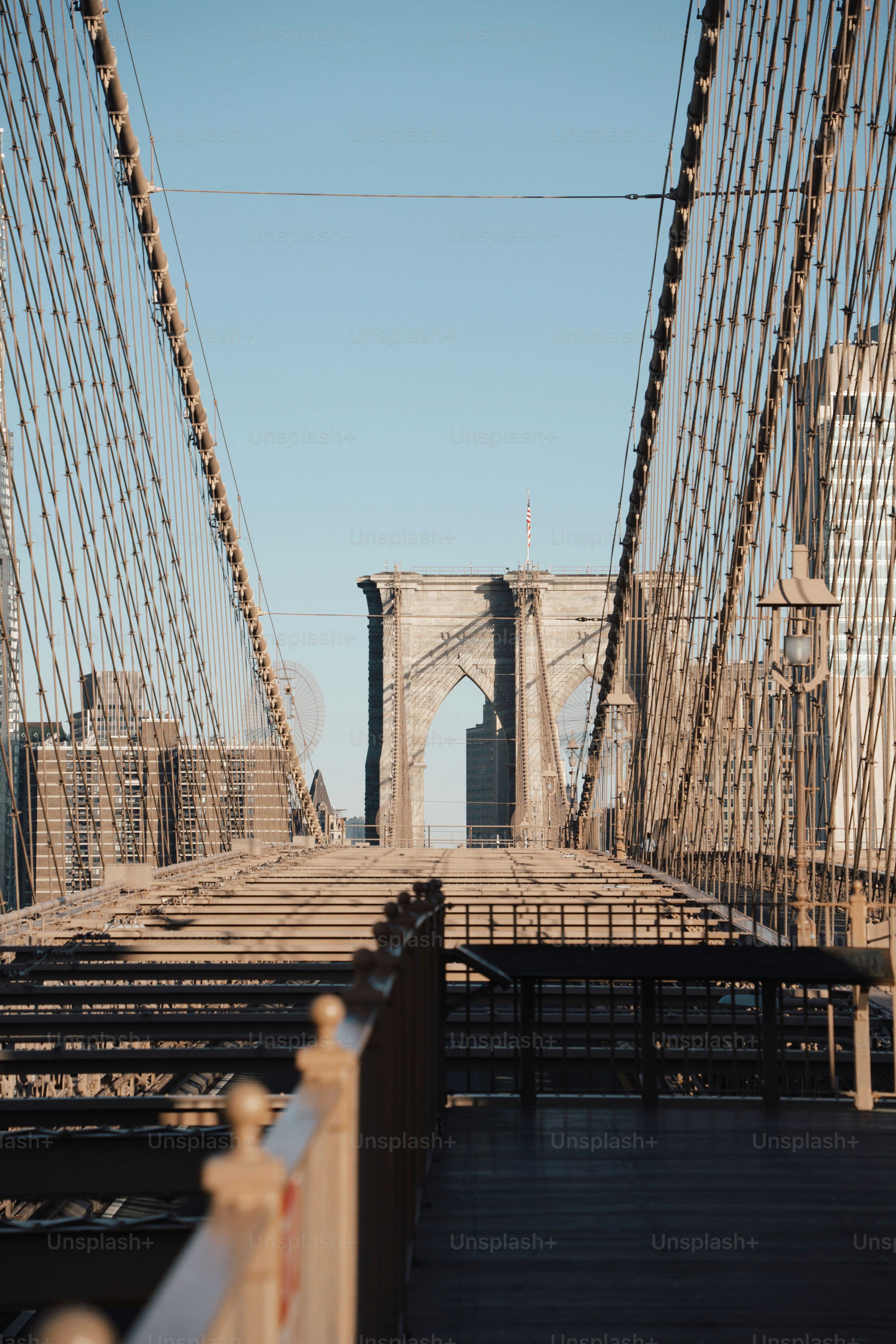 a view of the brooklyn bridge from across the river