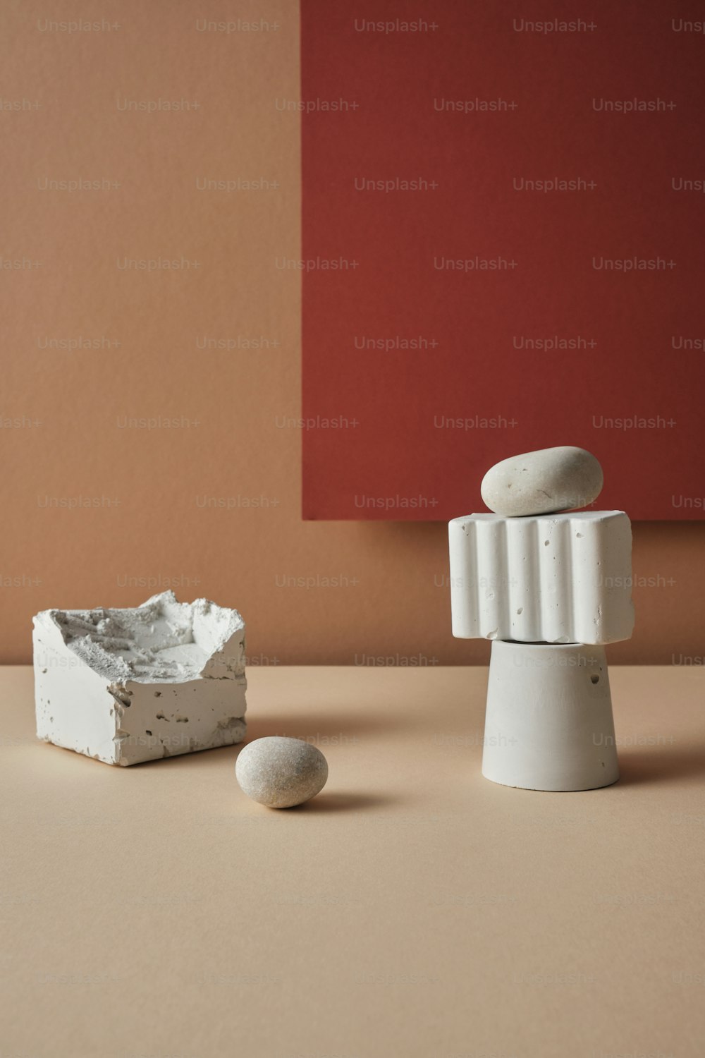 a white object sitting on top of a table next to a white object