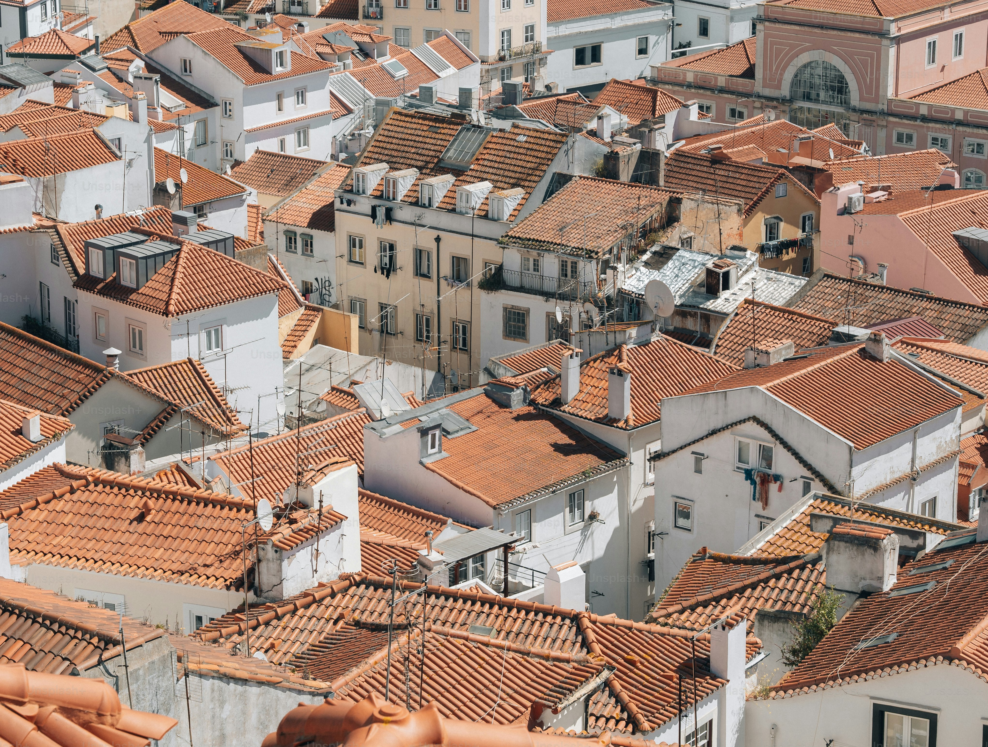 a view of the roofs of a city