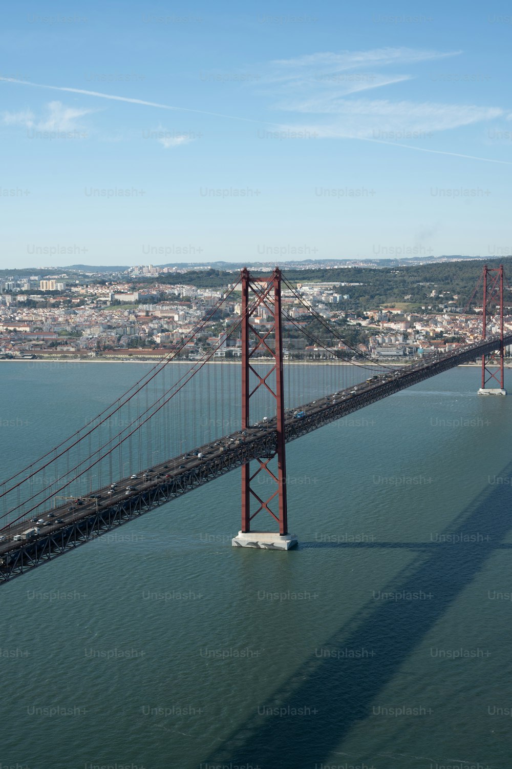 a large bridge spanning over a large body of water