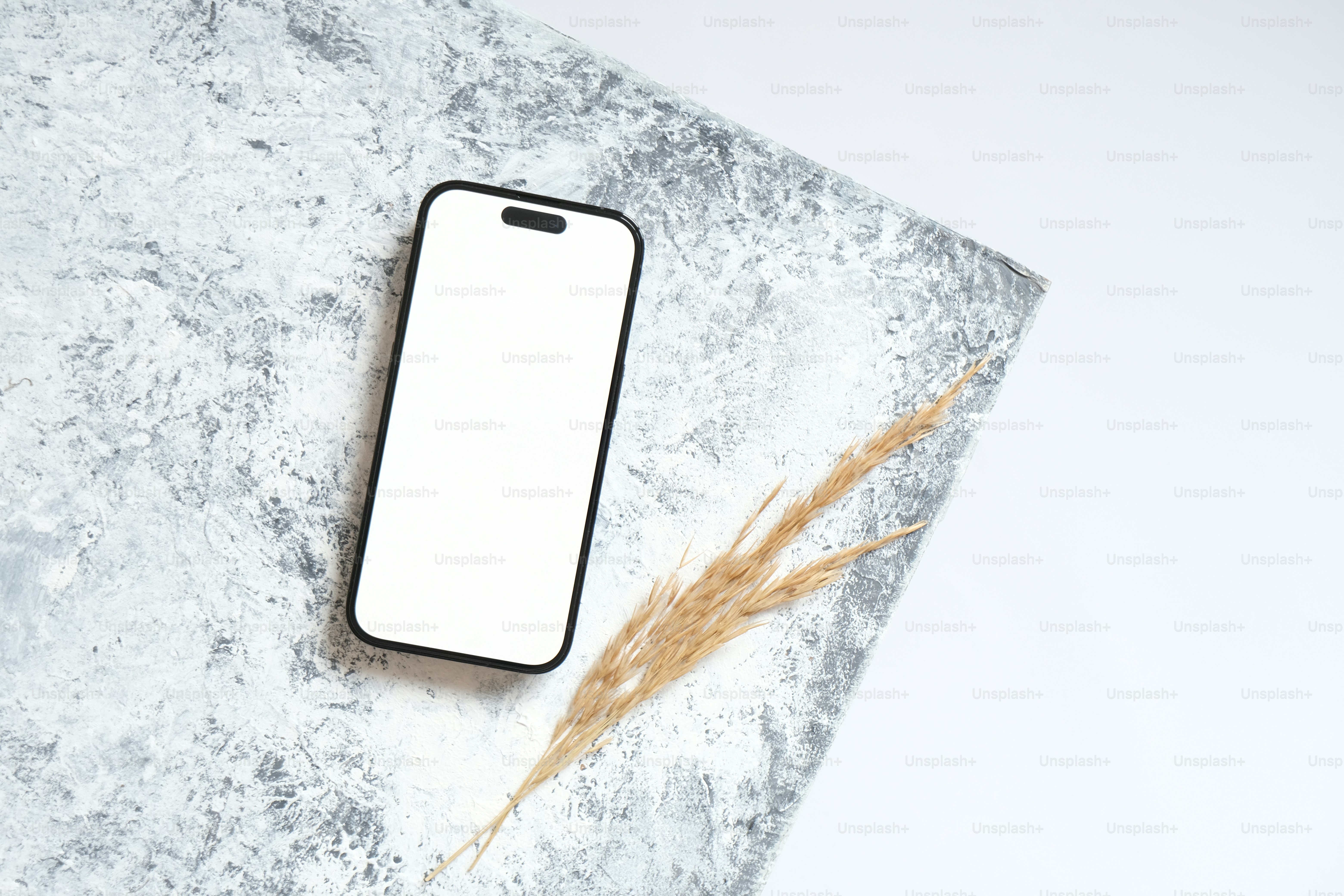 a white phone sitting on top of a table