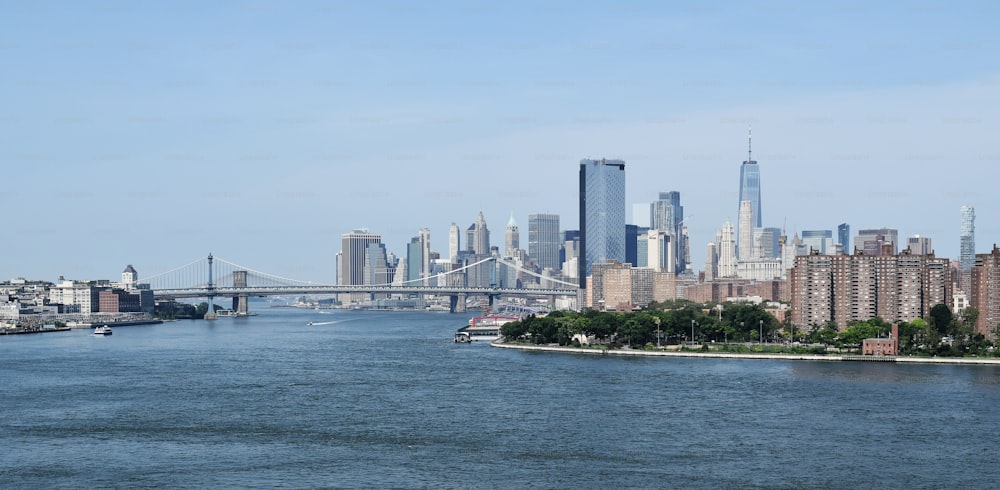 a large body of water with a city in the background