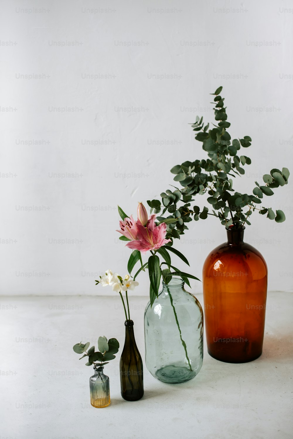 a couple of vases that are sitting on a table