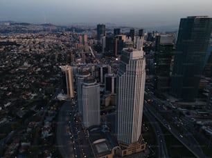 an aerial view of a city with tall buildings