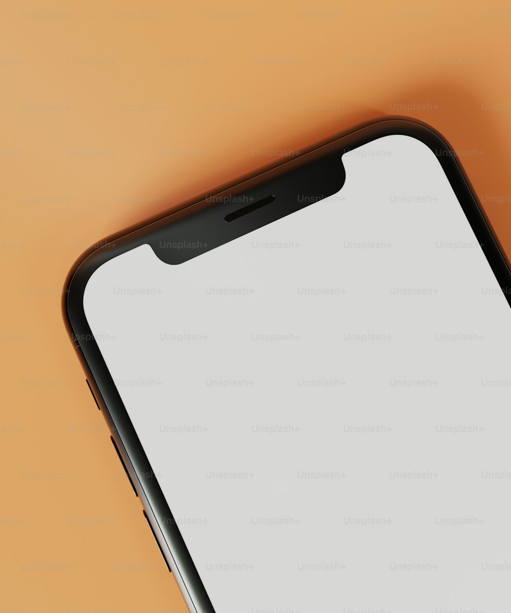a cell phone with a white screen on an orange background