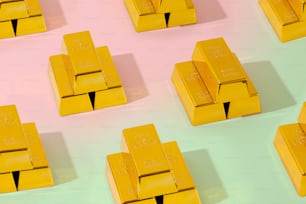a group of gold bars sitting on top of a table