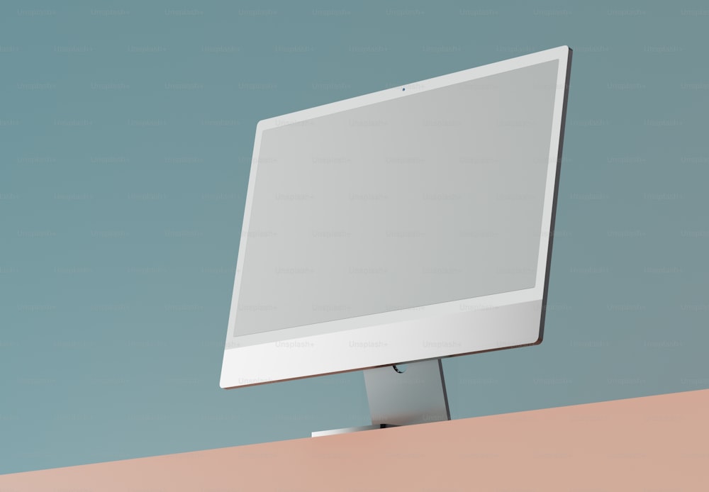 a computer monitor sitting on top of a desk