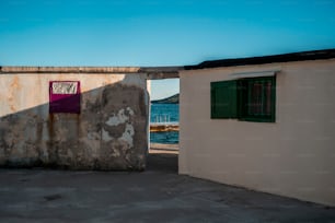 an old building with a door and a window