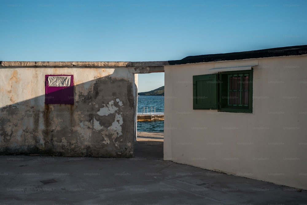 an old building with a door and a window