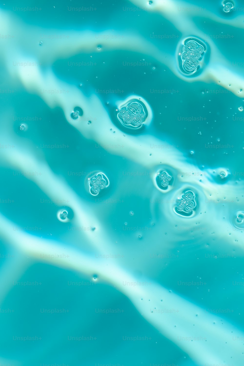 a close up view of water with bubbles