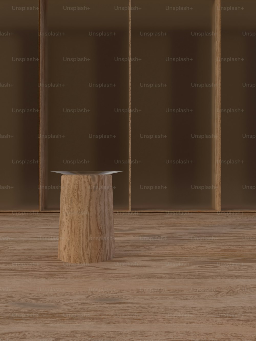 una mesa de madera sentada encima de un piso de madera dura