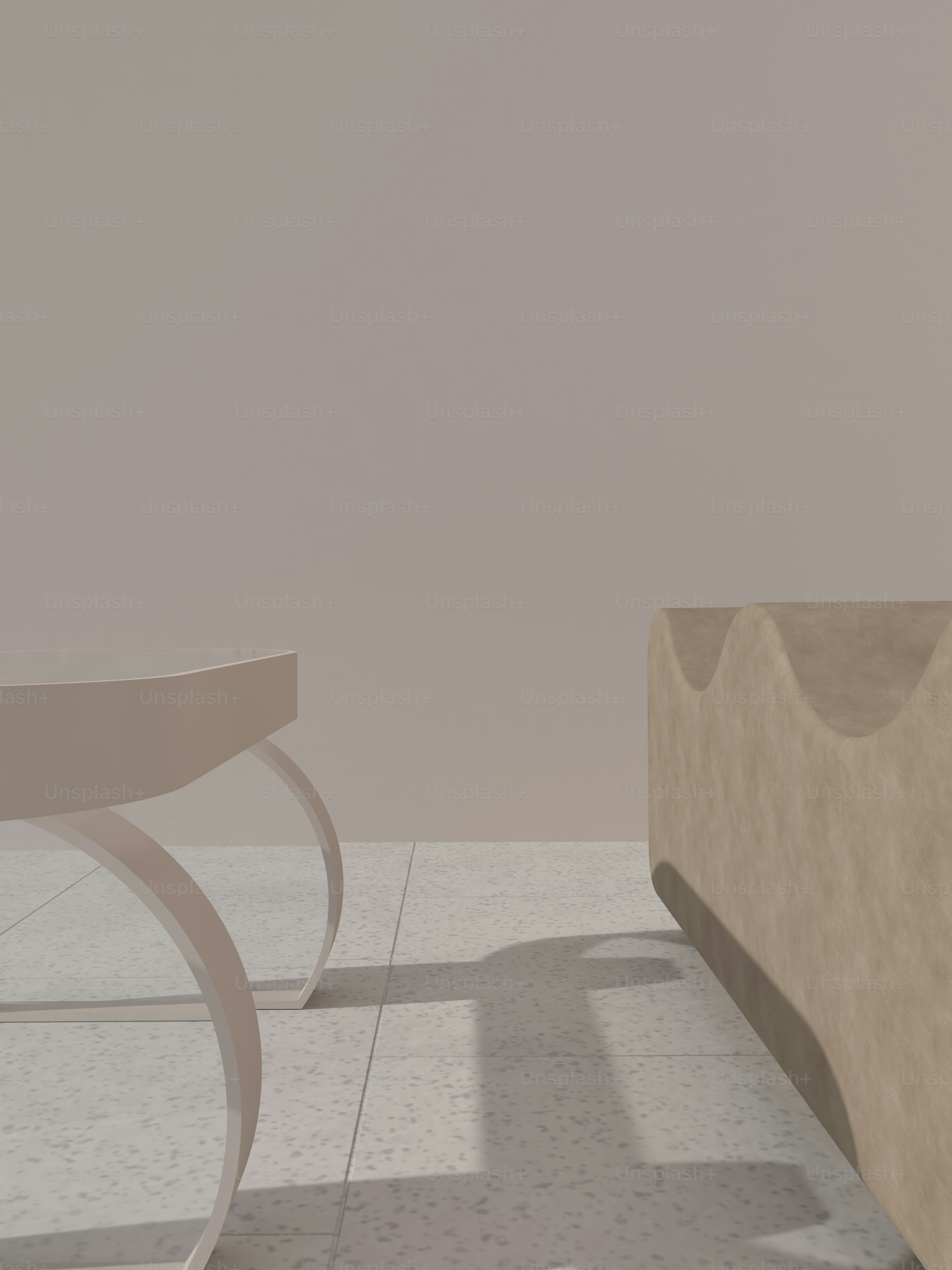 a white table sitting next to a white chair