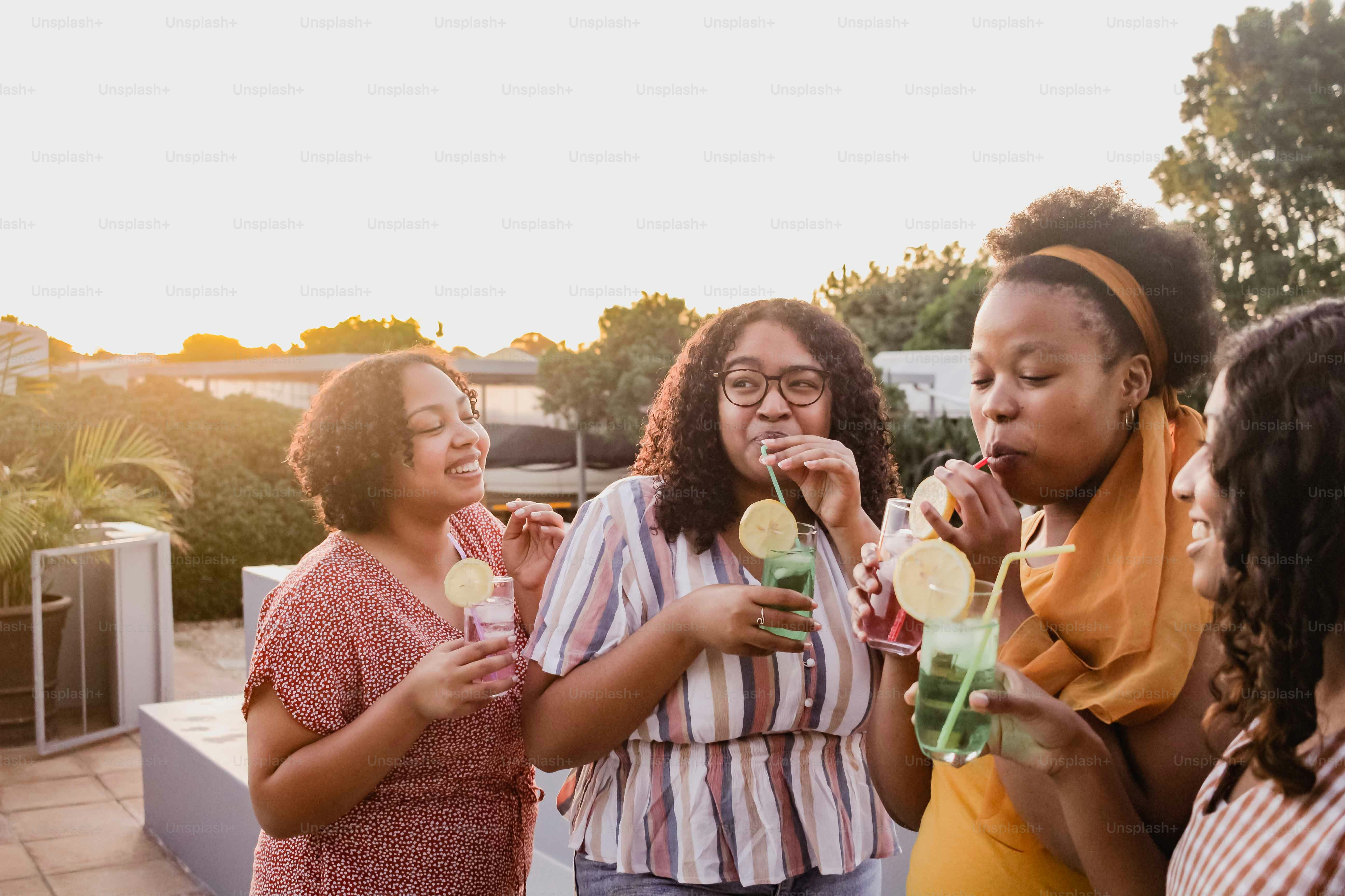 a group of women standing next to each other