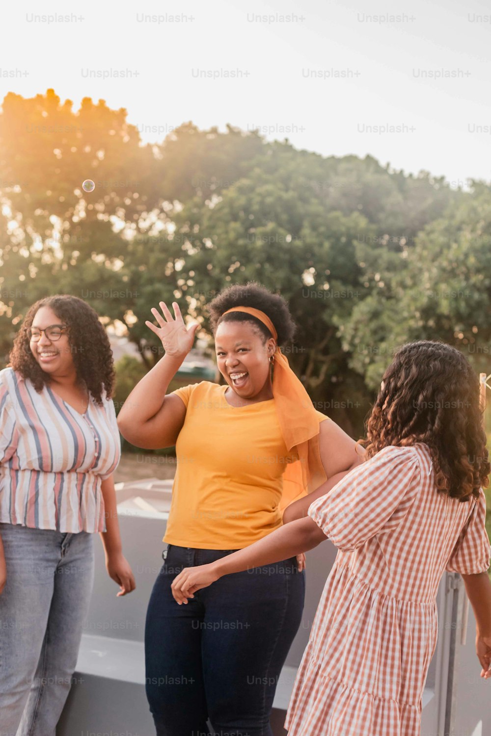 a group of women standing next to each other