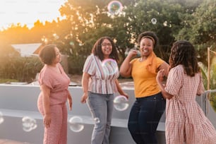 a group of women standing next to each other