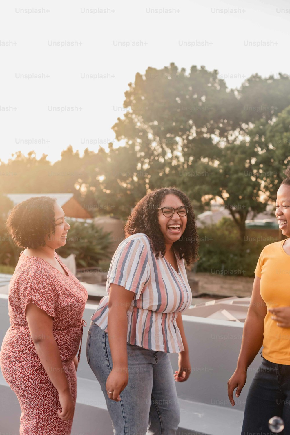 a group of women standing next to each other