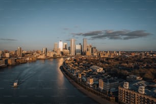 a river running through a city next to tall buildings