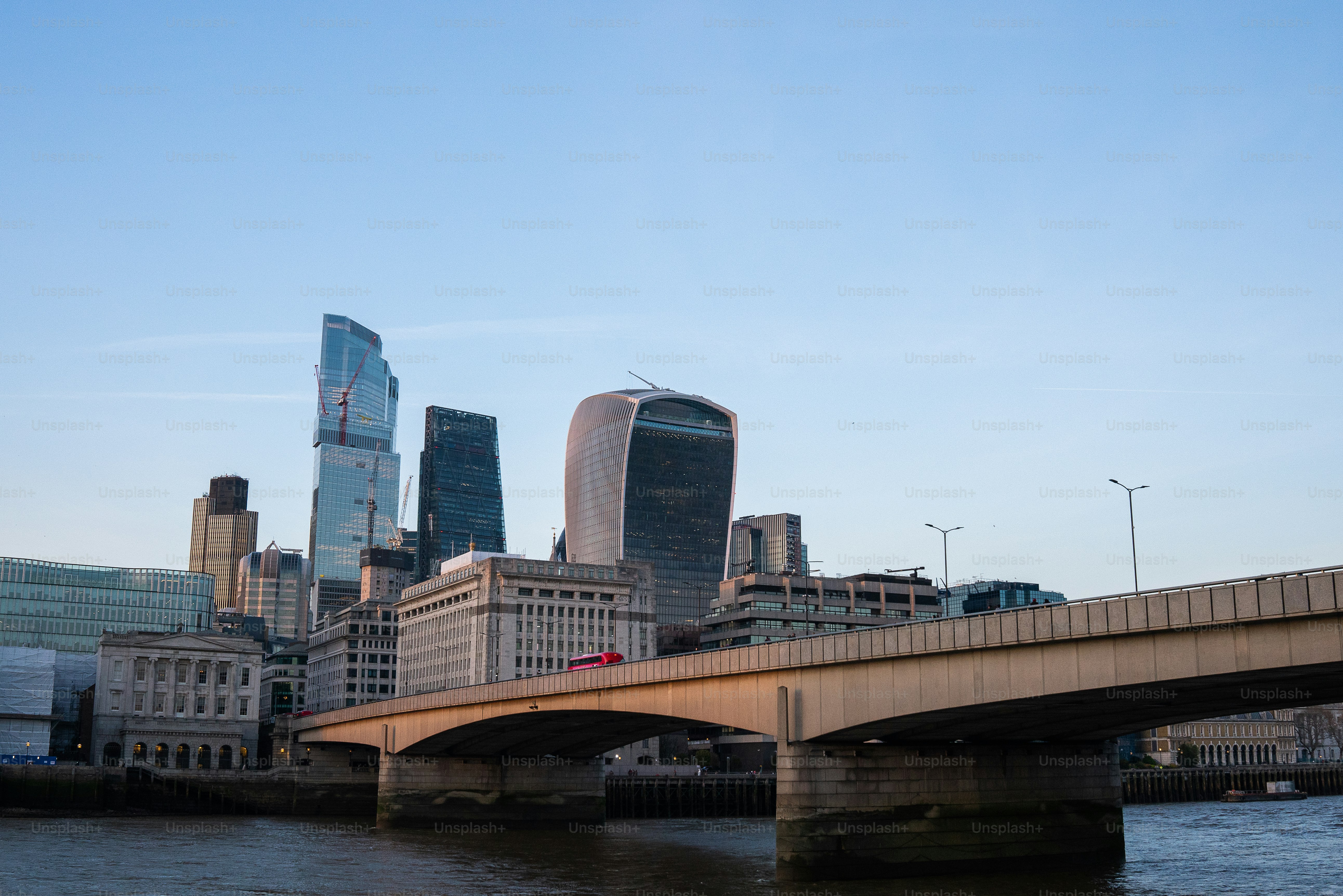 Sunset photo of the walkie-talkie building and London Bridge