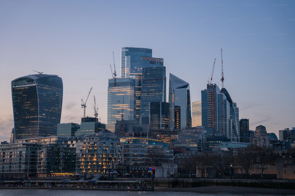 a view of the city of london at dusk